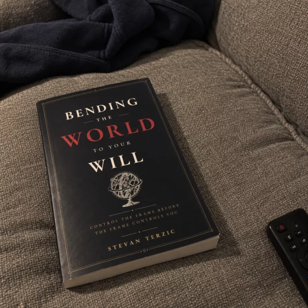 Illustrative scene: the paperback resting on a couch